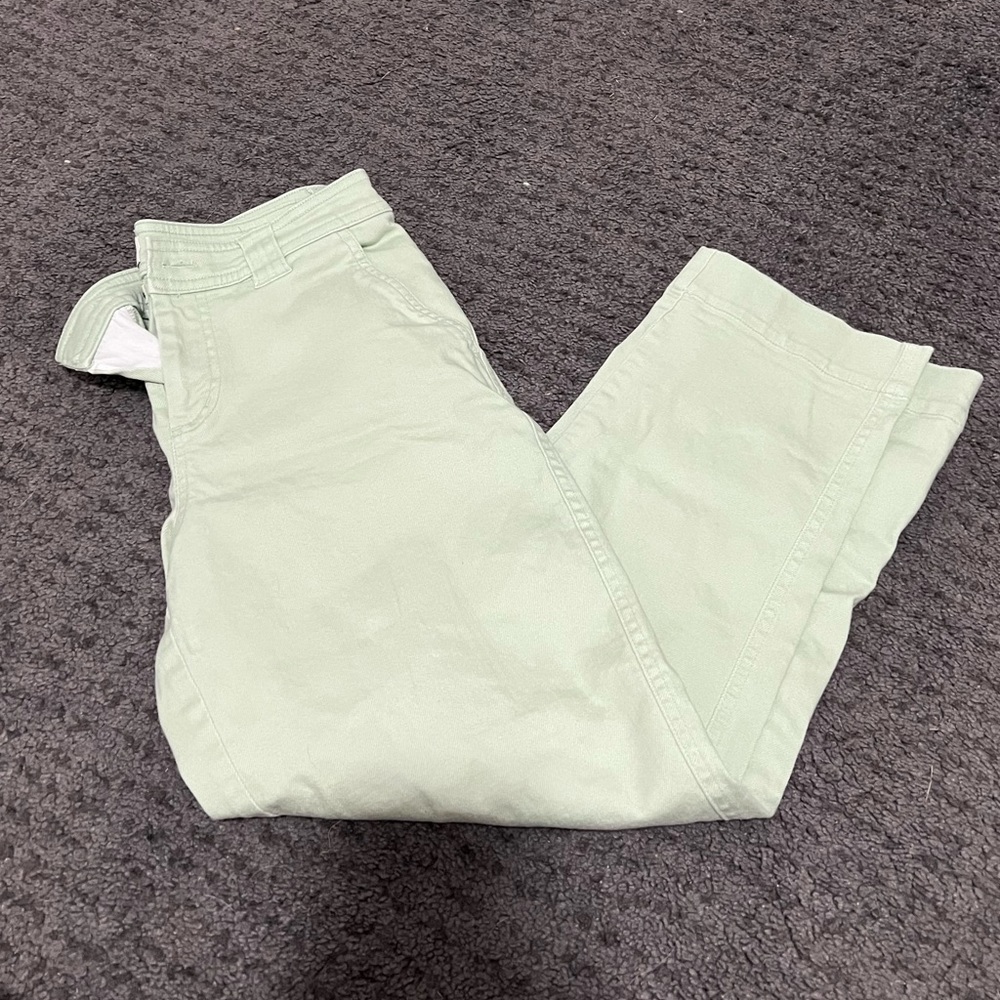 Light pastel green flare pants